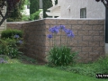 Slit face wall with a cement cap